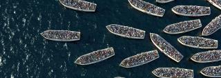 Aerial shot of refugee boats on water