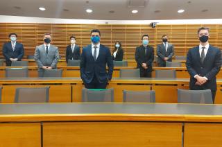 Participants standing in classroom