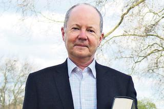 headshot of James Thorton with sky and trees in background
